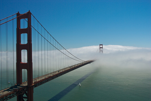 "Low clouds taking over the Golden Gate Bridge, San Francisco, California, USA". Photo by Camille King